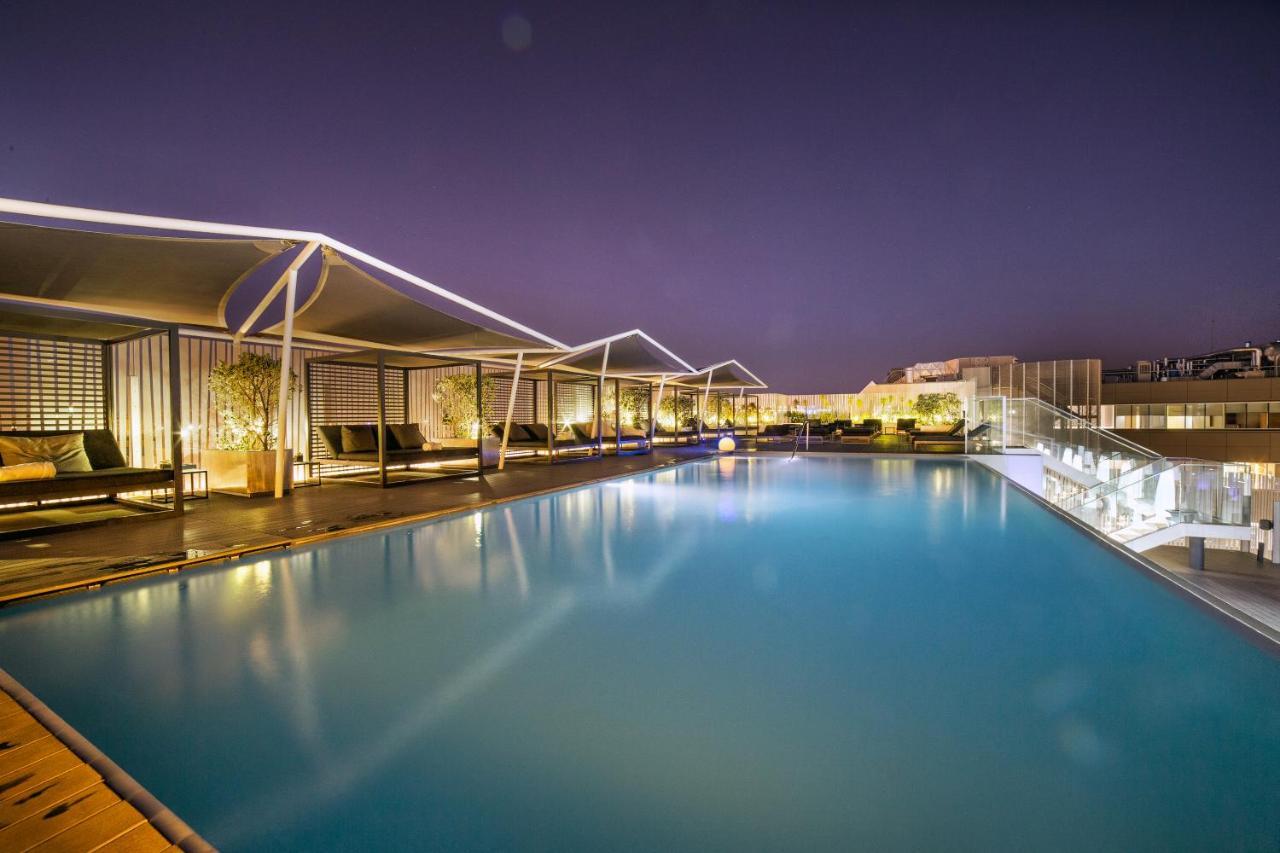Epic Sana Lisboa Hotel Екстериор снимка The swimming pool at the hotel